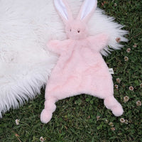 Dreamy days pink bunny comforter on grass