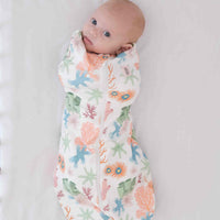 Dreamy days baby dream swaddle pink coral of white surface