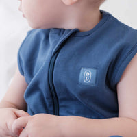 Toddler wearing a dreamy days navy dream sack