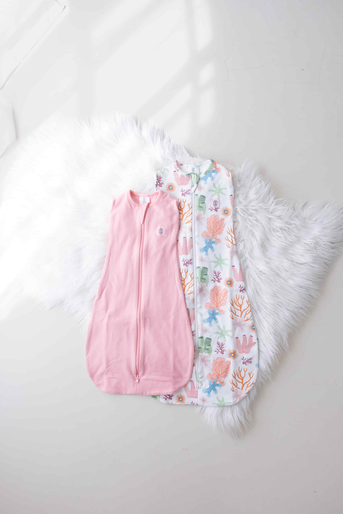 Dreamy days pink dream swaddle and the pink coral dream swaddle