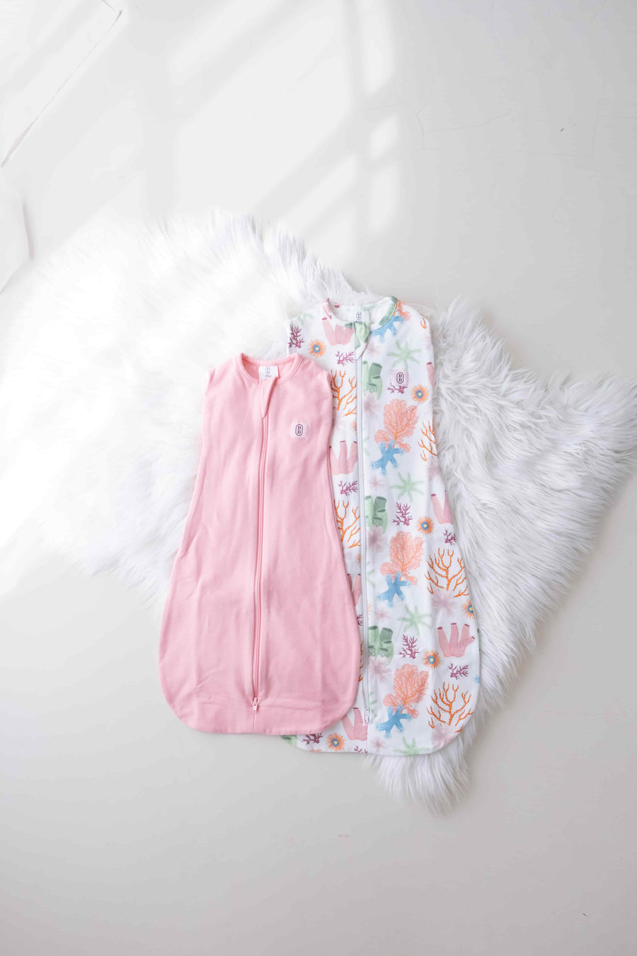 Dreamy days pink dream swaddle and the pink coral dream swaddle