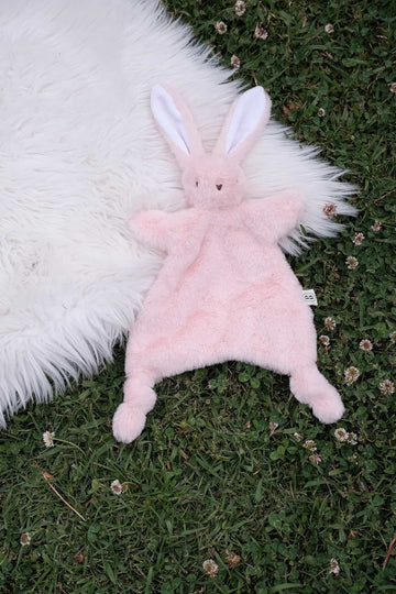 Dreamy days pink bunny comforter on grass